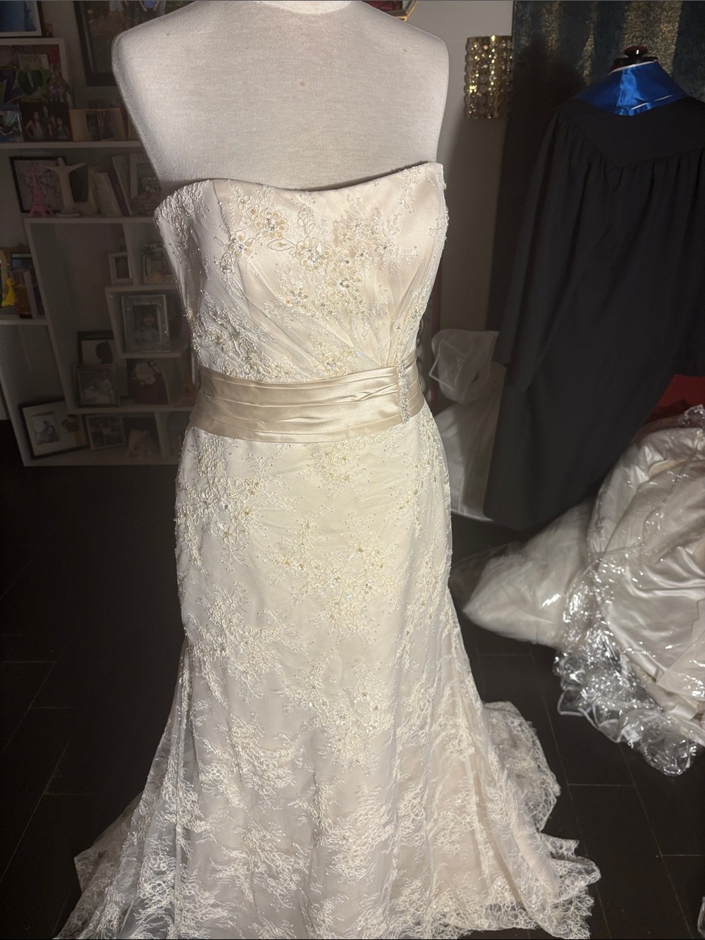 Strapless Ivory Lace Wedding Gown with Satin Sash